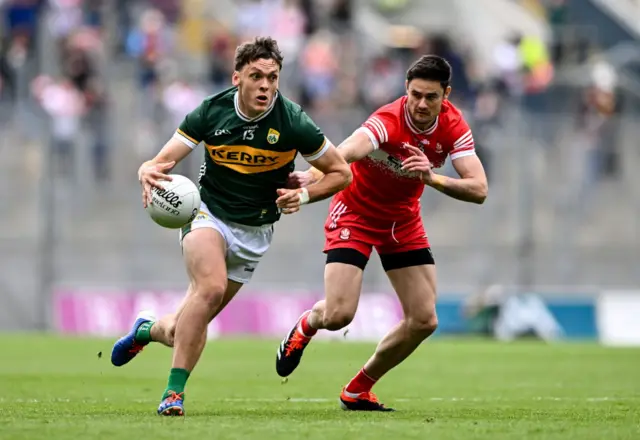 David Clifford of Kerry in action against Christopher McKaigue of Derry