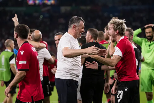 Georgia Head Coach Willy Sagnol (L) celebrates with his team