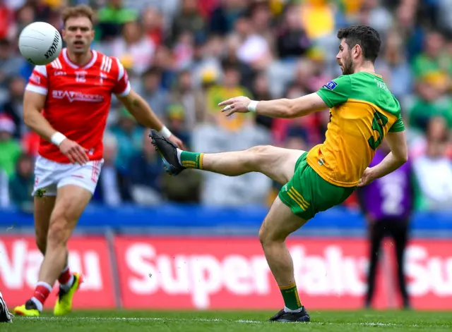 Ryan McHugh of Donegal shoots to score his side's first point