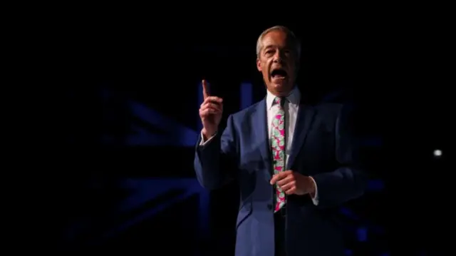 Nigel Farage speaking at a rally