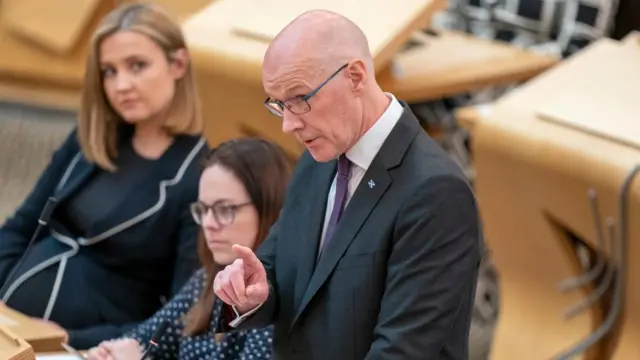 First Minister of Scotland John Swinney speaks during First Minister's Questions at the Scottish Parliament in Holyrood, Edinburgh. Picture date: Thursday May 30, 2024