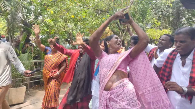 DMK party workers seen dancing out the party headquarters in Chennai