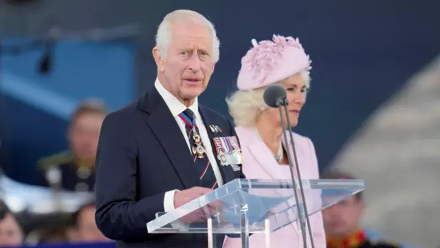 King Charles and Queen Camila speak during the D-Day 80 national commemoration event in Portsmouth