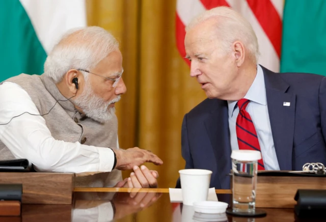 Narendra Modi and Joe Biden last year