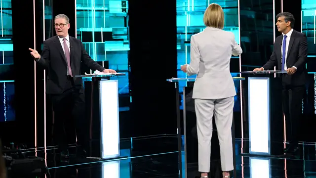 Rishi Sunak, host Julie Etchingham and Sir Keir Starmer during the ITV General Election debate