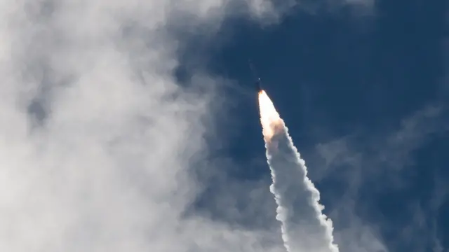 Boeing Starliner flies through clouds