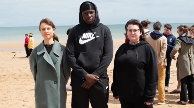 Helen, Kajali and Kate on the beach in Normandy