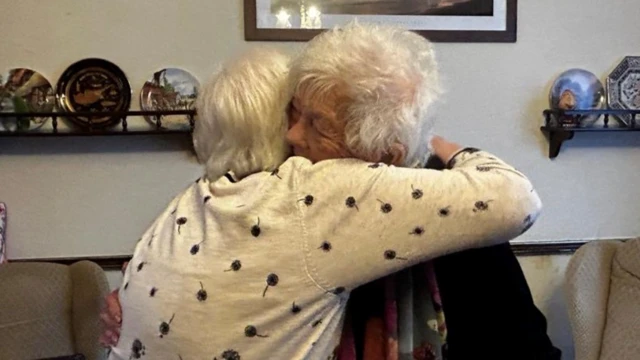 Doreen and Beryl hugging
