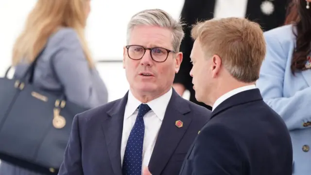 Labour leader Sir Keir Starmer speaking with Defence Secretary Grant Shapps ahead of the UK national commemorative event for the 80th anniversary of D-Day, held at the British Normandy Memorial in Ver-sur-Mer, Normandy, France