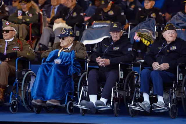 Veterans attend a ceremony to mark the 80th anniversary of D-Day at the Normandy American Cemetery