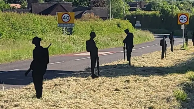 Silhouettes of soldiers
