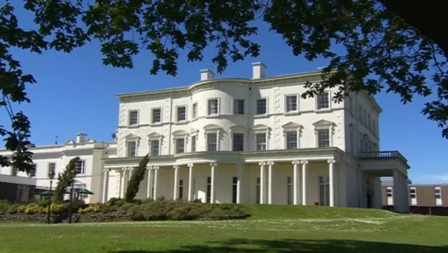 Southwick House exterior view with blue sky