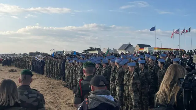 Military personnel on a beach