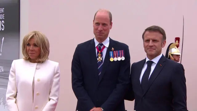 Prince William joins French President Emmanuel Macron and first lady Brigitte Macron at the International memorial ceremony on Omaha beach.