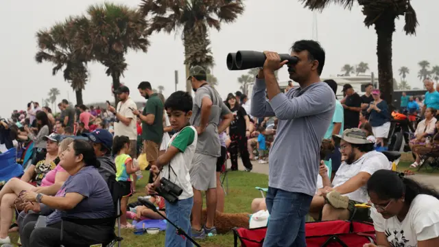 People wait for SpaceX's Starship rocket launch