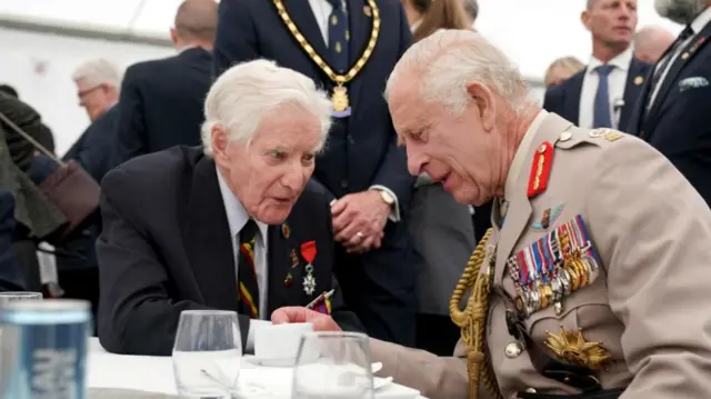 King Charles speaks to a D-Day veteran