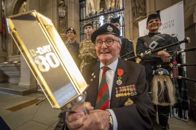 100 year-old veteran Lance Corporal Cyril Bird hands on the legacy of D-Day