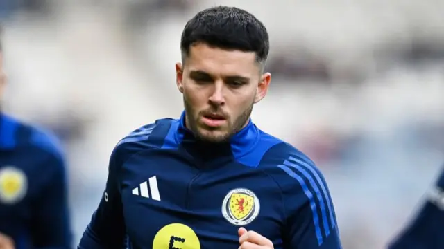 Lewis Morgan warming up at Hampden