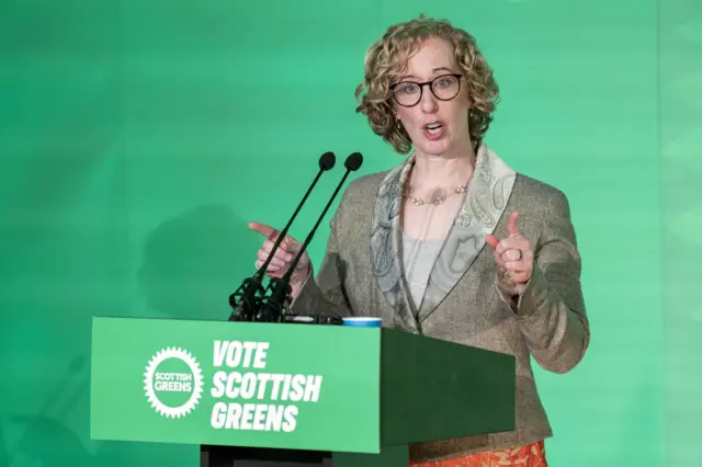 Scottish Green Party co-leader Lorna Slater speaking during the Scottish Green Party Spring conference against a green background