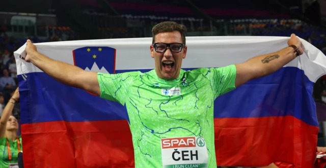 Slovenia's Kristjan Ceh celebrates after winning the men's discus throw final