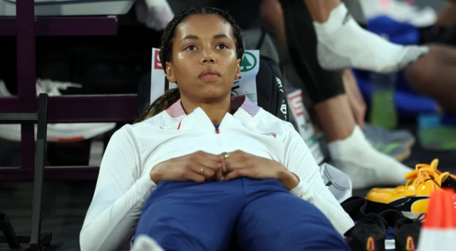 Morgan Lake relaxes during the women's high jump qualification