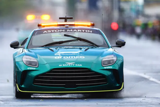 Safety car goes around a wet Circuit Gilles Villeneuve