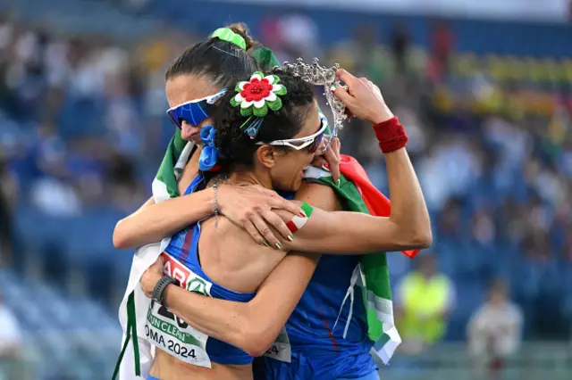 Gold medalist, Antonella Palmisano of Team Italy, celebrates with silver medalist, Valentina Trapletti o