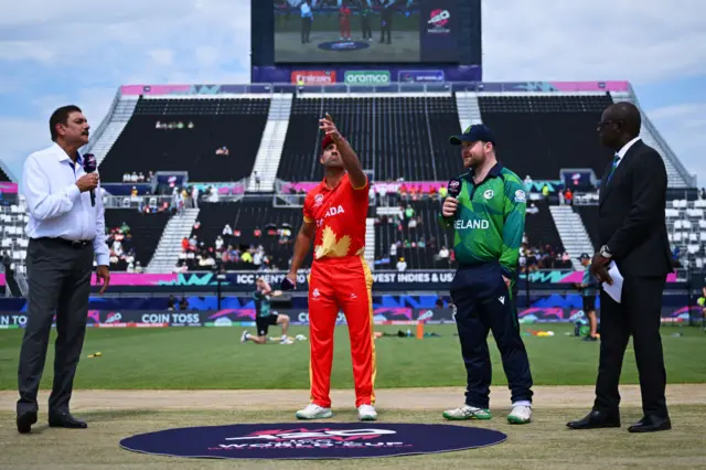 Saad Bin Zafar of Canada and Paul Stirling of Ireland look on in the coin toss during the ICC Men's T20 Cricket World Cup West Indies & USA 2024 match