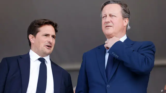 Veterans Minister Johnny Mercer talks to Foreign Secretary David Cameron