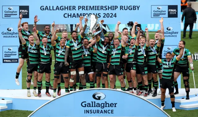 Northampton Saints lifting the Premiership trophy