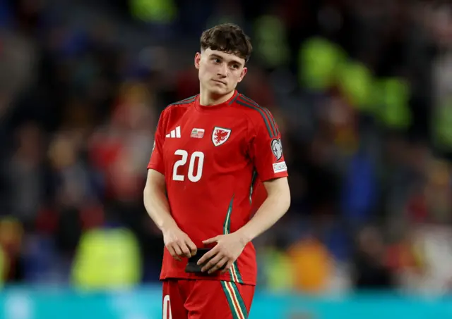 Dan James reacts after his missed penalty against Poland in March