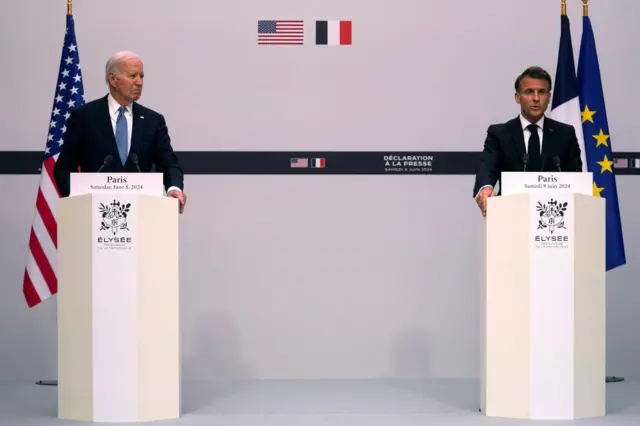 President Joe Biden listens to French President Emmanuel Macron during a joint statement on Saturday, June 8, 2024 at the Elysee Palace in Paris