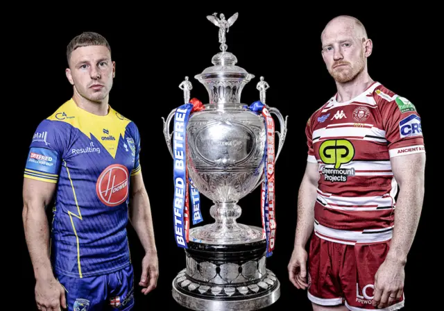 George Williams of Warrington and Liam Farrell of Wigan pose with the Challenge Cup trophy ahead of the final