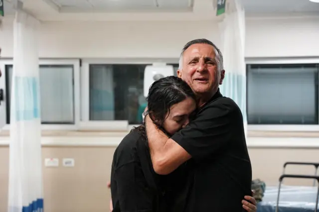 Noa Argamani embraces her father Yakov Argamani after being rescued