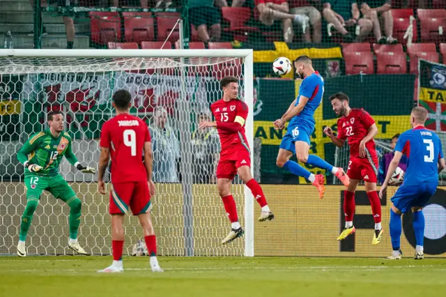 Ethan Ampadu competes for a header