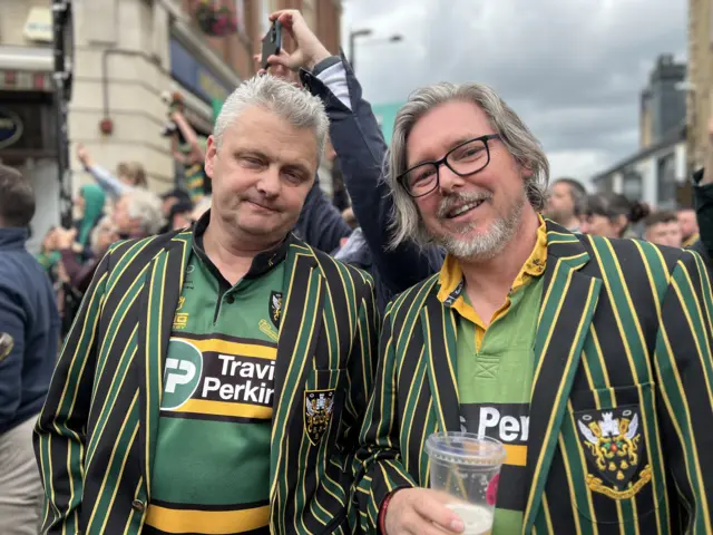 Luke Doran and Matthew Fell wearing team blazers at the celebrations