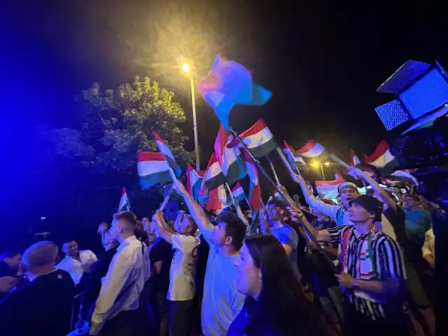 Tisza party supporters, celebrating their party's gains