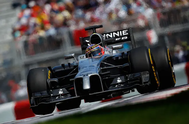 Jenson Button driving the 2014 McLaren in Canada