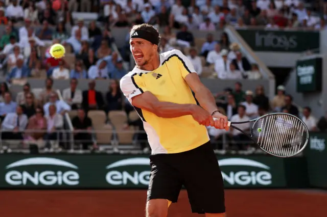 Alexander Zverev swings for a backhand