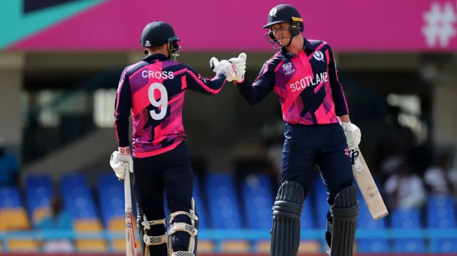 Matthew Cross and Brandon McMullen celebrate