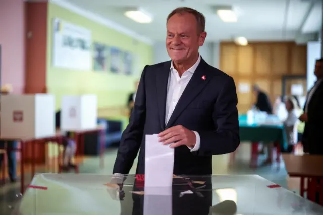 Polish PM Donald Tusk casting his ballot in the European election in Warsaw