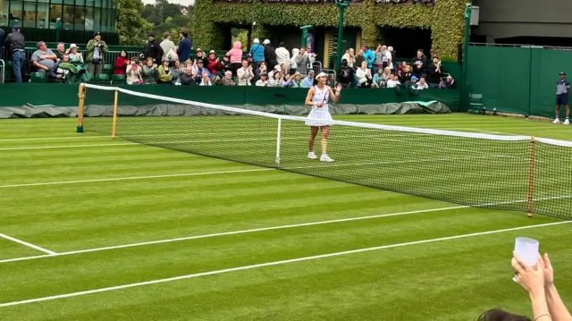 Yuriko Lily Miyazaki waving to court 16