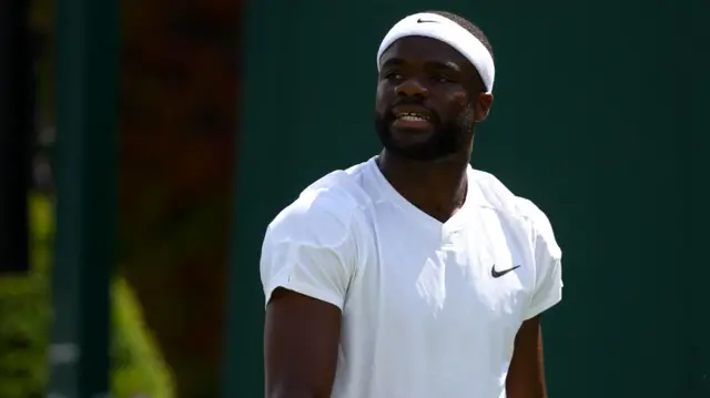 Frances Tiafoe in action at Wimbledon