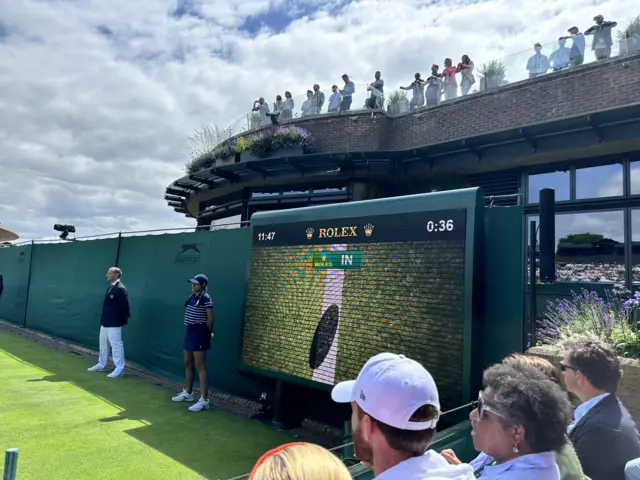 Big screen on court 18