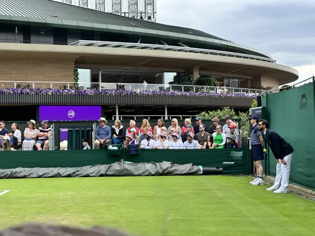 Spectators supporting Heather Watson