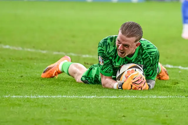 Jordan Pickford celebrating with the ball in his hand