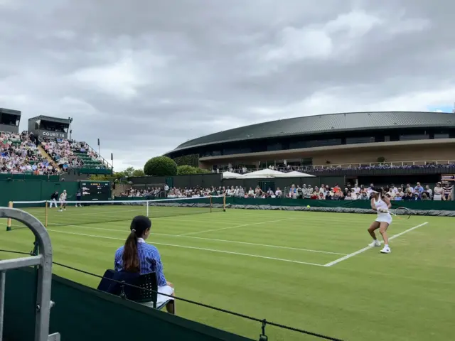 Heather Watson swinging a backhand