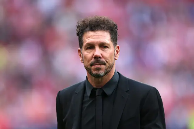 Diego Simeone, Head Coach of Atletico Madrid, looks on