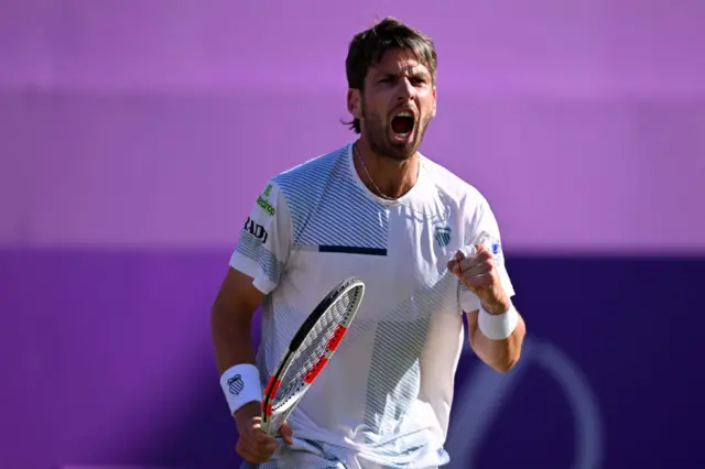 Cameron Norrie pumps his fist in celebration