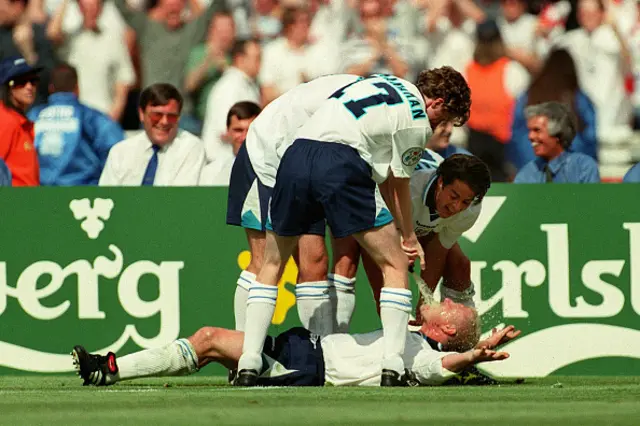Alan Shearer, Jamie Redknapp and Steve McManaman of England celebrate with Paul Gascoigne